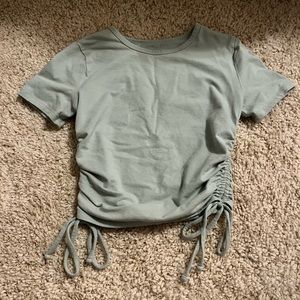 A teal Hollister baby tee.